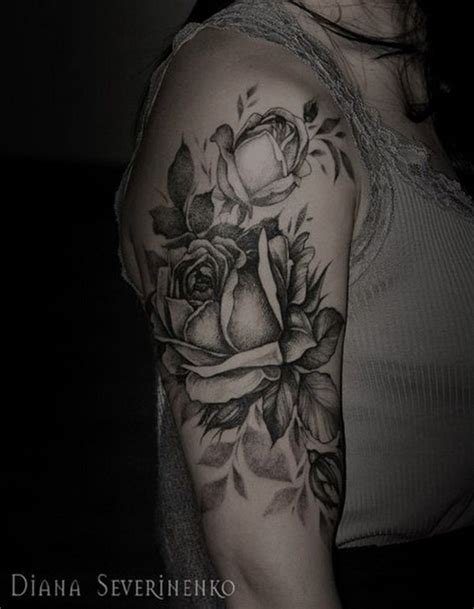 This tattoo includes a black and white inked lion's face with two roses below the lion. 40+ Cool and Pretty Sleeve Tattoo Designs for Women