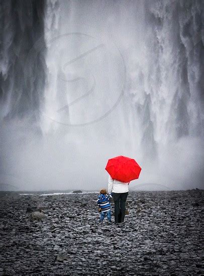Freedom Waterfall Umbrella Mother Child Red Holding Hands Water