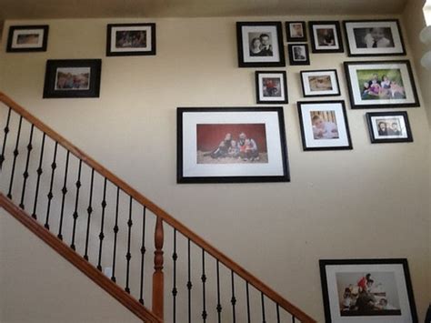 Making wall photo collage is a wonderful idea to decorate your house. Stairway photo collage