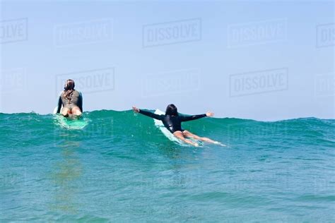 Female Friends Surfing Hermosa Beach California Usa Stock Photo