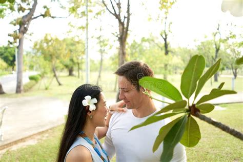 Newly Married Couple Gazing At Each Other In A Park Stock Image Image Of Embracing Diversity