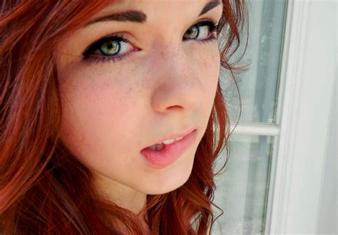 Green Eyes Freckles Redhead Girl Biting Lip Face Wallpaper