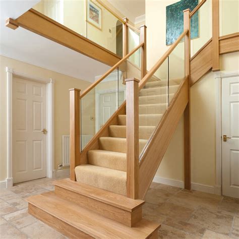 Red oak is the most common wood choice and is easy to stain, sand and finish, so you can easily customize the staircase. Luxury Oak and Glass Staircase | Neville Johnson