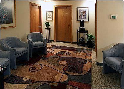 Blogger stacy risenmay's home office features plenty of open shelving. #PsychiatristMentalIllness | Counseling waiting room ...