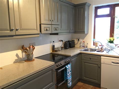 A fresh color can make all the difference. Newly painted grey kitchen - using white "ronseal" tile ...