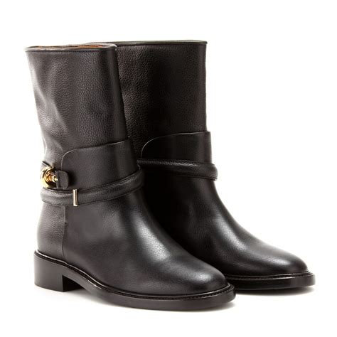 I love the way the shoes balance swanky and edgy. Balenciaga Leather Biker Boots in Black - Lyst