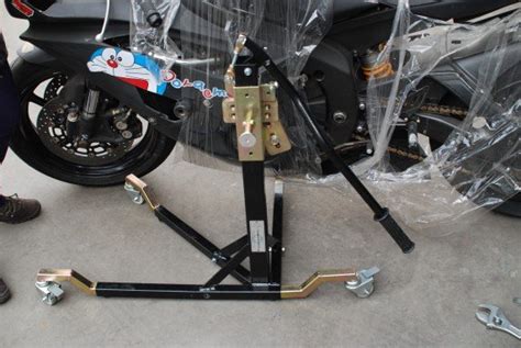 While you'll find both are competitively priced, the latter is more heavy and robust, allowing you to use with larger bikes, such as suzuki. Steel Dolly System Center Moving Motorcycle Clawer Stand ...
