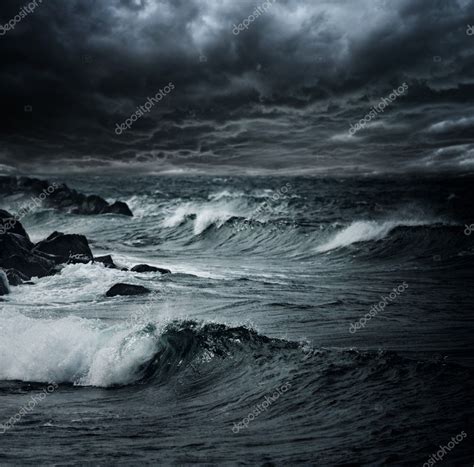 Dark Stormy Sky Over Ocean With Big Waves Stock Photo By ©nejron 24040919