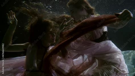 Two Fairy Women Are Floating Together Underwater Lesbians Lovers Are