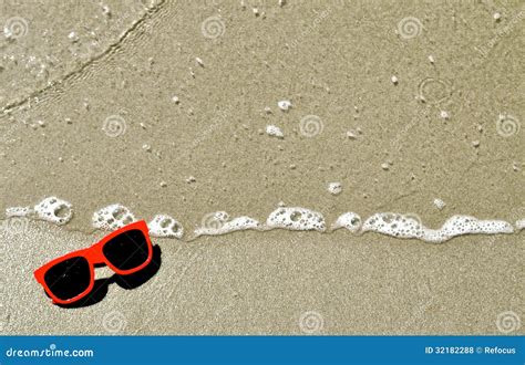 In The Sand Sunglasses 13 Stock Photo Image Of Beach Background