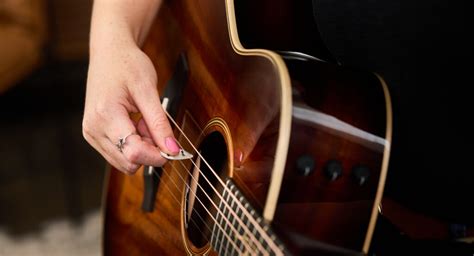 How To Hold A Guitar Pick Taylor Guitars