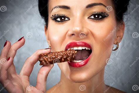 Young Woman Eating Sweet Stock Image Image Of Elegant 13907135