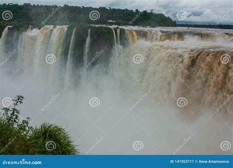Tourists Visiting The Devil S Throat Waterfall In The Iguazu Falls One