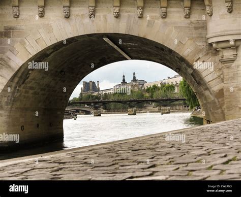 Paris Through The Pont Neuf Bridge Stock Photo Alamy