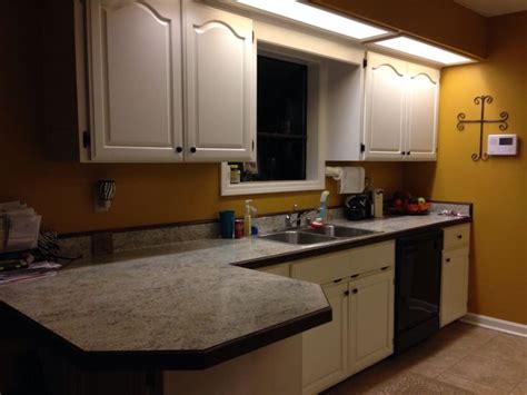Painting wood trim white without losing your mind should be the real title of this post because, well i have done it the right way and the wrong way, and nearly lost my mind. White cabinets and white counter with dark wood trim | For ...