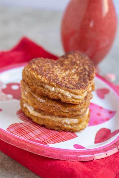 heart shaped cream cheese stuffed french toast recipe with strawberry sauce