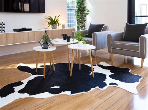 Brighten up a neutral palette Decorating With Cowhide Rug | Cowhide rug living room ...