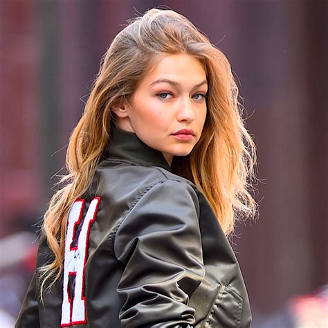 it looks like gigi hadid s hair is bright red now glamour