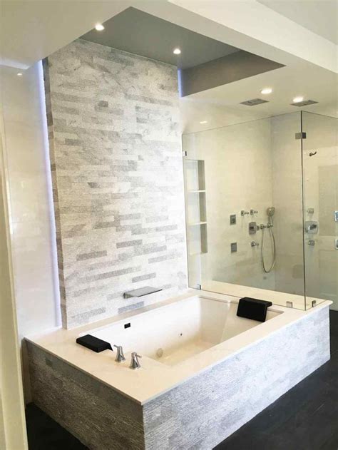 Has anyone seen or had experience with installing a soaking type size bathtub but in a more typical shower/tub combination with the faucets on the wall. Bathtubs Rhpinterestcom Unique Japanese Tub Shower ...