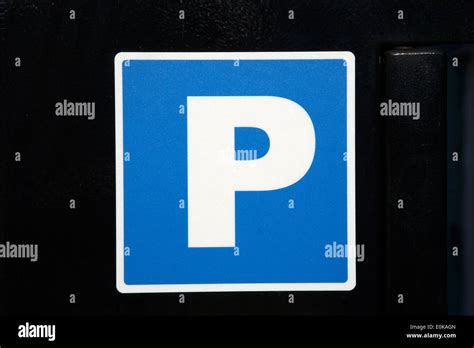 Blue Parking Sign Against Black Background Stock Photo Alamy