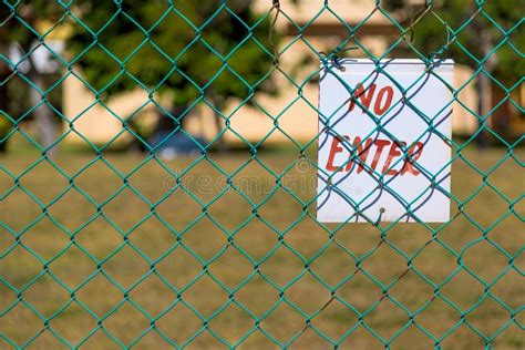 No Enter Sign On Green Fence Close Up Outdoors Stock Photo Image Of