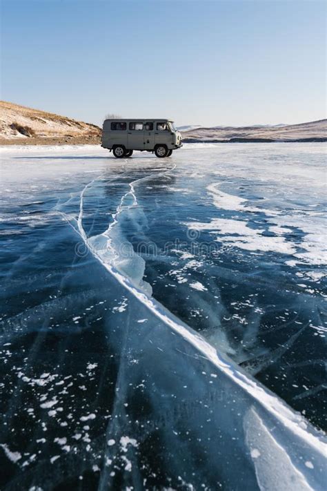 Travelling In Winter At Frozen Lake Baikal In Siberia Russia Tourist