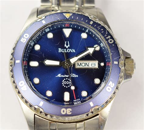 Stainless Steel Bulova Marine Star 200 Blue Dial Watch On Metal Strap