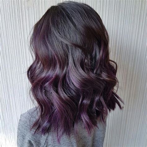 Bright purple is often used to portray a rebel. Short dark hair with purple/aubergine highlights ...