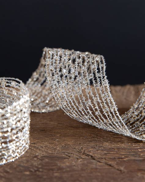 From traditional santa shapes to playful animal figures, adorn your tree with ceramic, metallic and fabric ornaments. Silver and Platinum Christmas Tree Ribbon | Balsam Hill ...