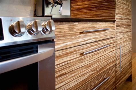 Is a full service renovation company that services the greater vancouver area. Striped Bamboo kitchen with Paperstone countertops ...