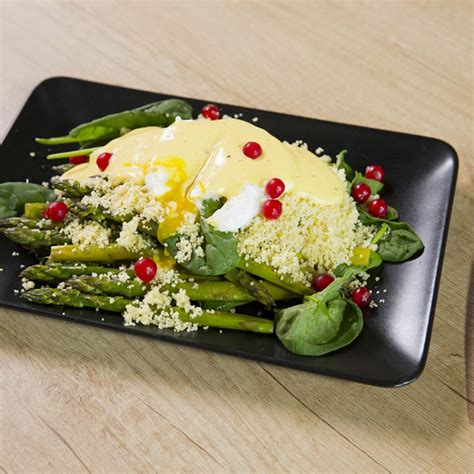 There are 176 calories in 1 cup, cooked (5.5 oz) of couscous, cooked. Poached Eggs with Couscous and Asparagus