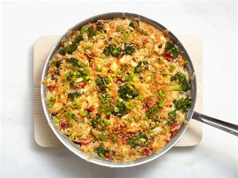 This cheesy chicken broccoli rice casserole recipe is a healthy version of the classic with no cream of anything soup. Chicken and Rice Casserole Recipe | Food Network Kitchen ...