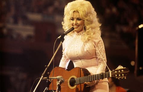 Dolly Parton Addresses Rumors That She's Covered In Hidden ...