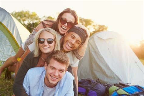 Group Of Friends Hanging Out Together At A Music Festival Stock Photo