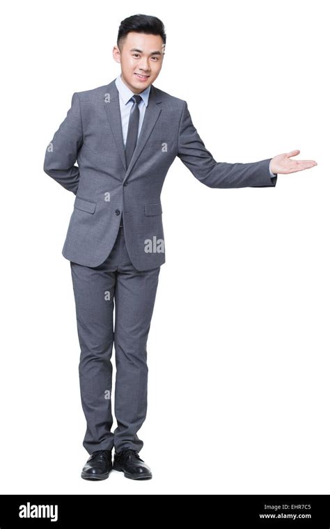 Young Businessman Greeting Stock Photo Alamy