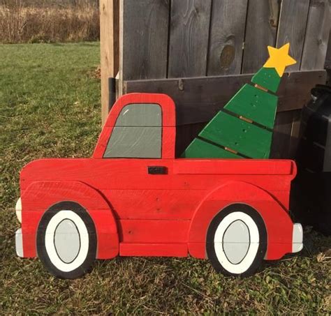 This Large Vintage Red Christmas Truck Sign Is Bringing Home The