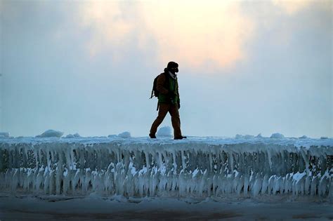 Lake Michigan Frozen Over Amid Dangerous Temperatures