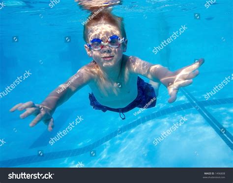 Boy Swimming Underwater In Swimming Pool Stock Photo 1496808 Shutterstock