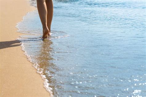 Woman Walking Through Water On Seashore Stock Photo Image Of Leisure Paradise