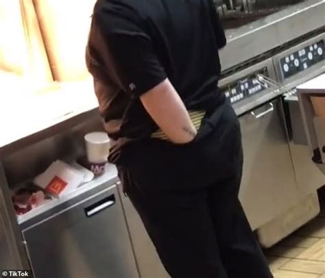 McDonalds Employee Is Filmed Reaching Her Hand Down The Back Of Her Trousers Dancing