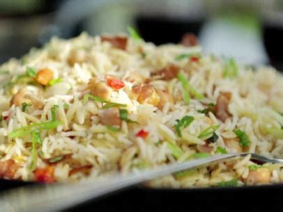But basmati rice that's been cooked in a mixture of chicken broth and coconut milk then seasoned with a little chopped fresh ginger and scallions? Basmati Rice Recipe | Ina Garten | Food Network