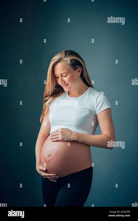 pregnancy motherhood people and expectation concept close up of happy pregnant woman with