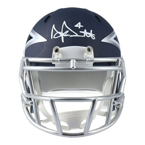 A coaster with the engraved logo of the nfl team dallas cowboys. Dak Prescott Signed Dallas Cowboys AMP Speed Mini Helmet ...