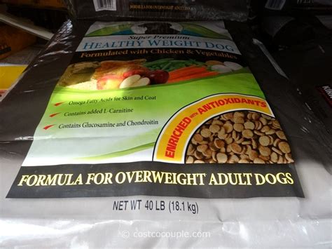 Ingredients include chicken meal, rice, fish meal, and vegetables like sweet potato. Kirkland Signature Super Premium Healthy Weight Dog Food