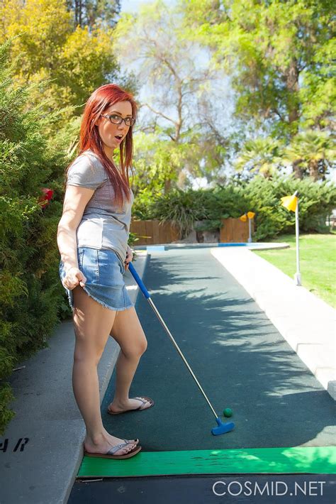 Redhead Coed Sherri Green Lifts Her Skirt And Fondles Her Pussy On A Mini Golf Course Porn