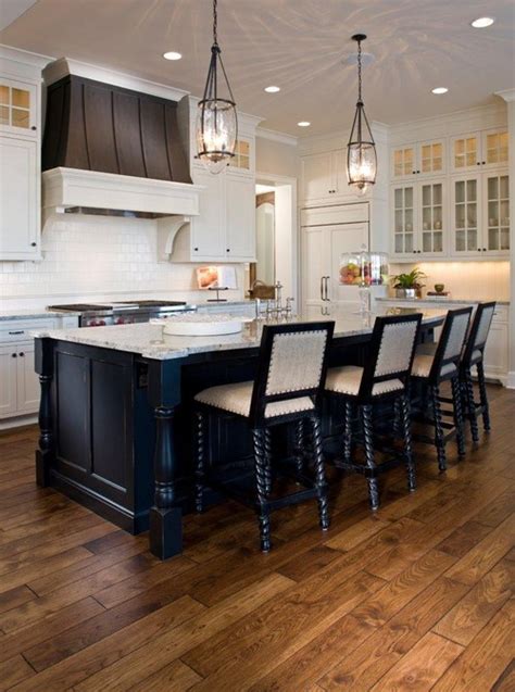 Are you debating how many light fixtures to hang above your kitchen island? I am trying to figure out how many pendants I should have ...