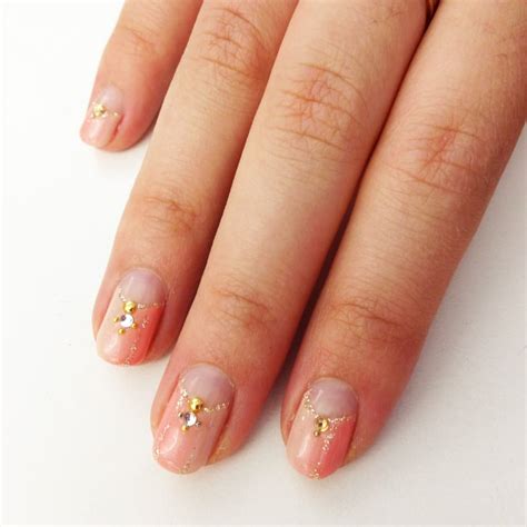 They pair well with rhinestones but just to ensure they don't dominate, add them on one or two fingers and let the white color be the center of attention. Gel Nail Art Tips | POPSUGAR Beauty