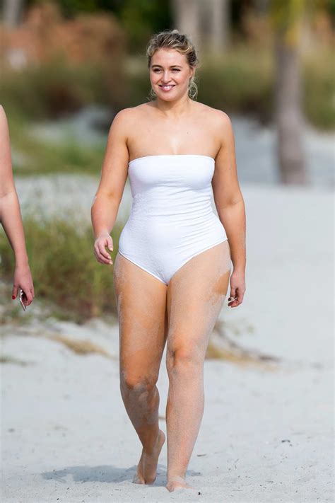 Iskra Lawrence Seen Wearing A White Swimsuit During A Beach Photoshoot