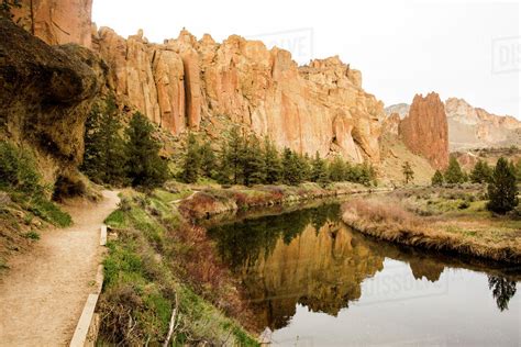 Desert Cliffs Reflecting In Still River Smith Rock State Park Oregon