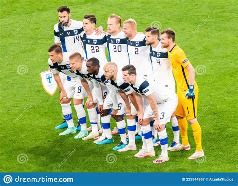 finland national football team defender jukka raitala against belgium winger nacer chadli during
